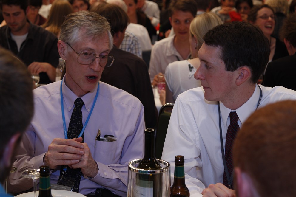 Laureate John Mather (Physics 2006) with young researcher during the Singaporean evening