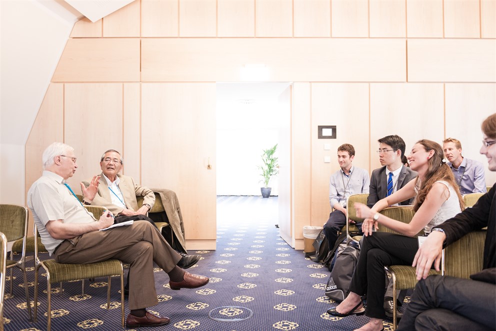 Jean-Marie Lehn and Ei-ichi Negishi holding an afternoon discussion with young scientists.  
