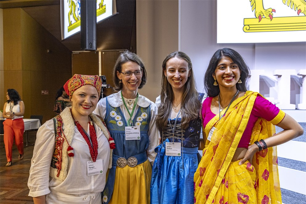 Young Scientists and Countess Bettina Bernadotte in traditional attire at the Bavarian Evening